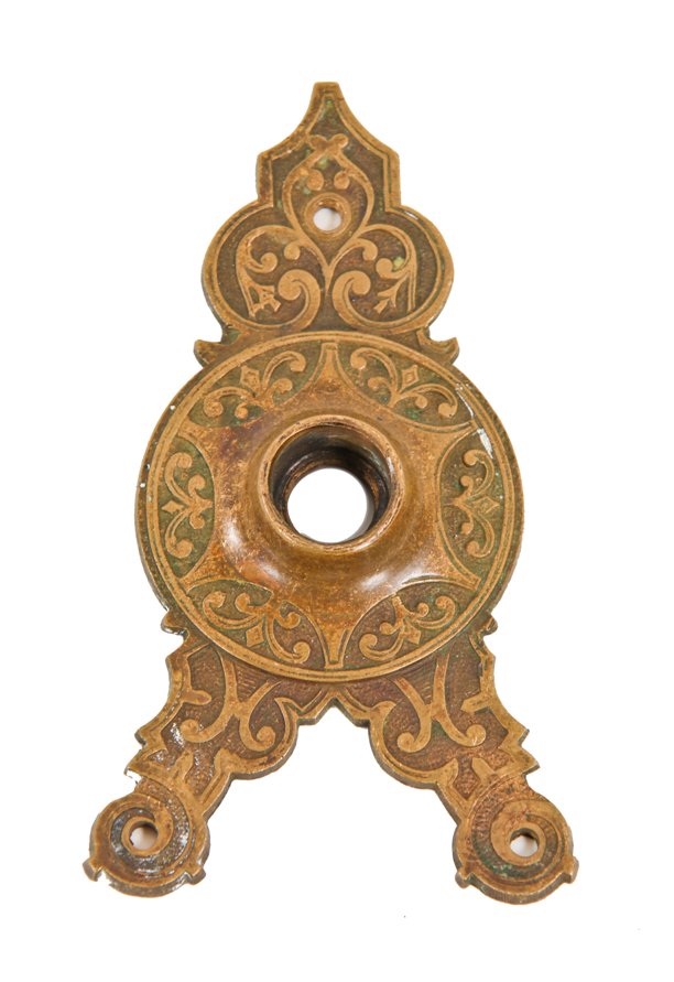 19th century american victorian era residential ornamental cast bronze triangular-shaped doorknob escutcheon with undisturbed surface patina 