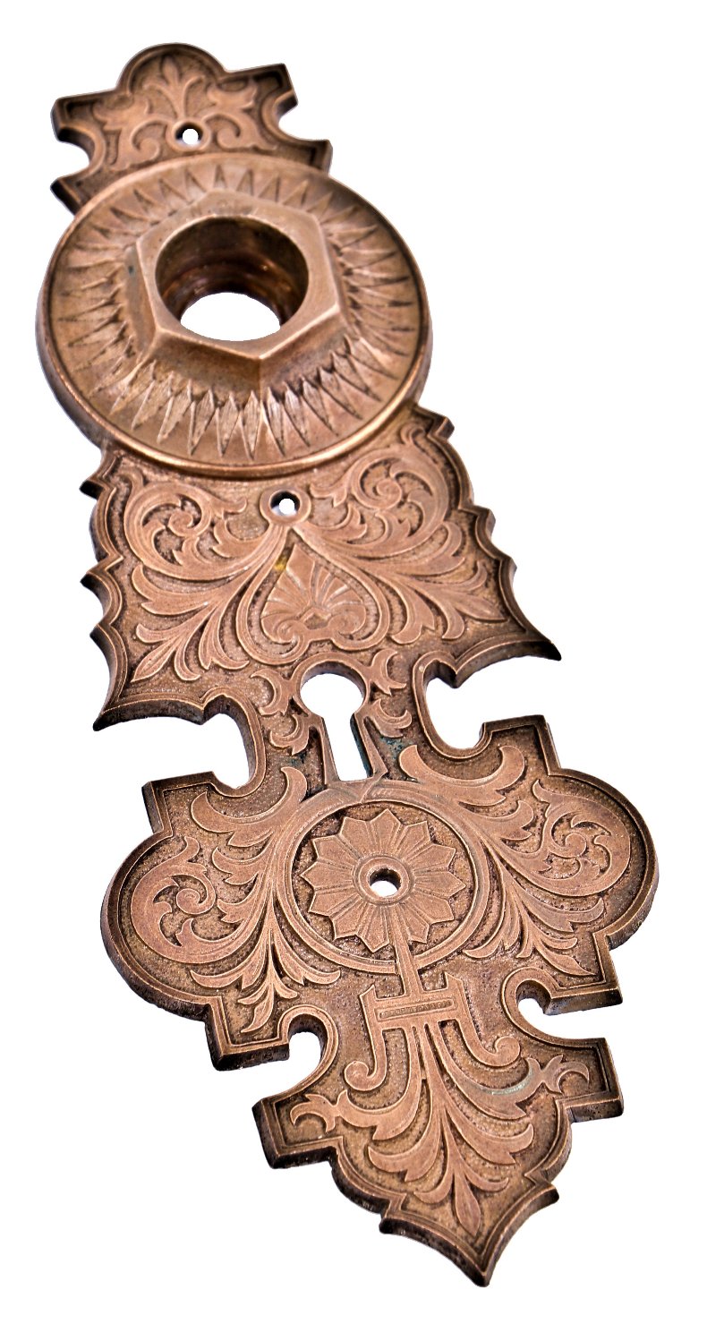 original early 1870's antique american residential solid cast bronze entrance door escutcheon designed for the metallic compression casting co., in boston.