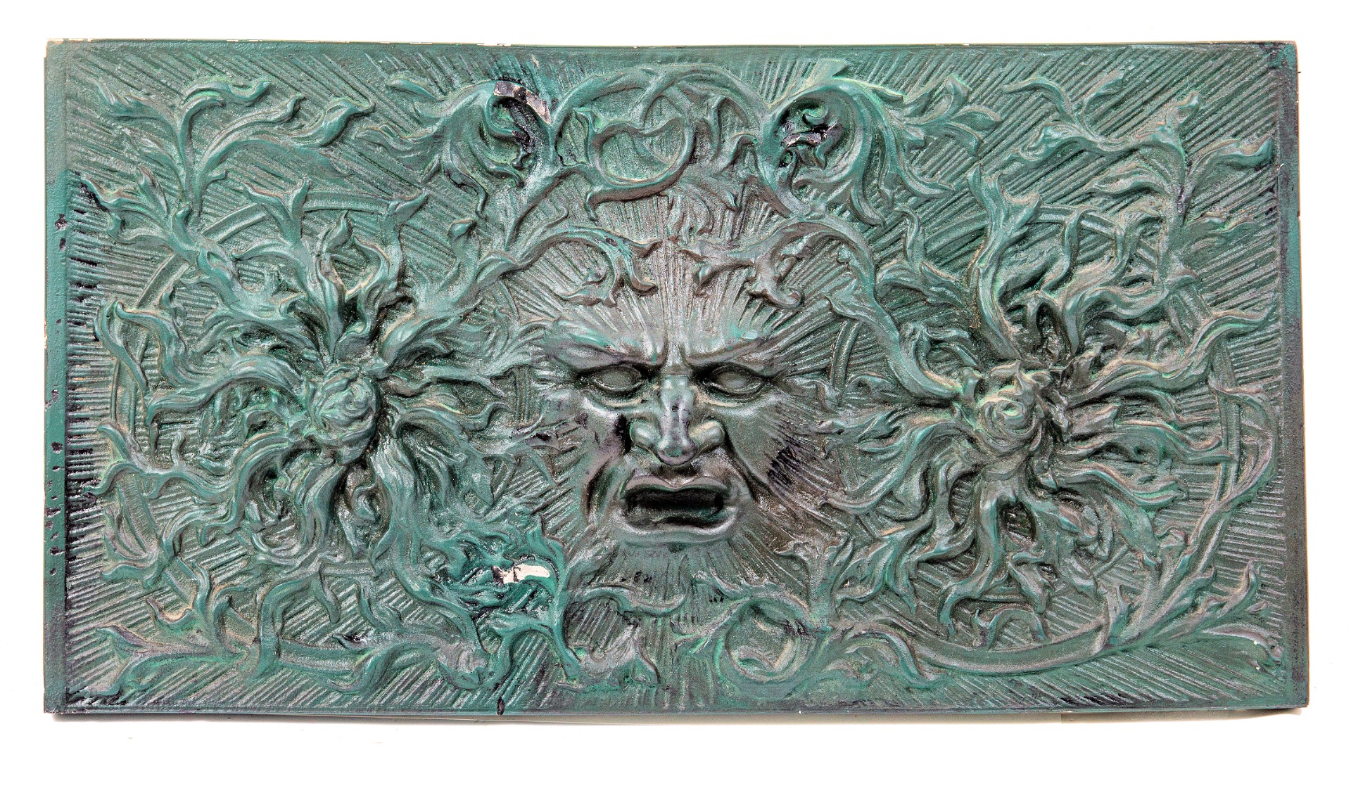 unusual painted green recast of a 19th century american victorian-era fireplace fireback with centrally located  
