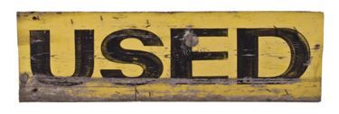 original and remarkably intact vintage c. 1920's primitive yellow and black paint "used" exterior wood sign