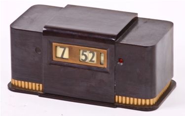 original and remarkably intact art deco style late 1930's "new executive" brown bakelite analog desk clock