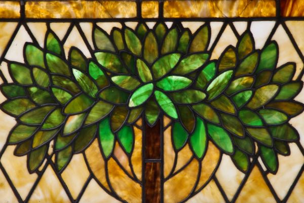 stunning c. early 20th century unusually designed american craftsman style heavily leaded art glass window with brilliantly colored leafage