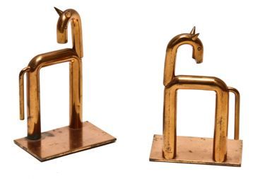 matching set of original and highly desirable c. 1932 american art deco walter von nessen copper horse bookends