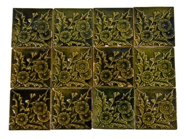 twelve original and remarkably intact matching late 19th c. well-crafted antique american salvaged chicago green majolica victorian era fireplace tiles with bold floral motifs