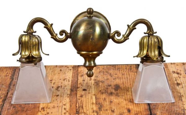 fanciful and fully intact 1910 2-arm dark brass interior residential wall sconce with glass pyramidal shades 
