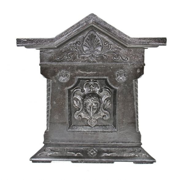remarkably rare and highly unusual pre-chicago fire heavily ornamented cast iron chicago commercial building facade plaque with deep relief figure