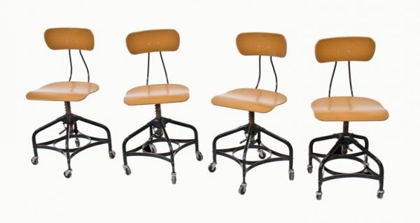 set of four original and intact c. 1950's vintage american industrial "uhl art steel" adjustable height factory office toledo stools