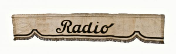 c. 1930's original and intact american art deco interior retail store "radio" ornamental "korrect" advertising drapery or valance 