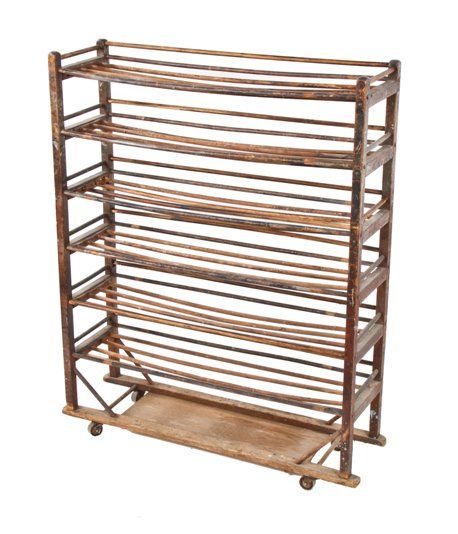c. early 20th century american naturally aged oak multi-tier oak wood industrial baker's rack with original steel casters