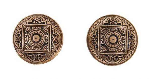 two matching original antique american interior residential passage size dome-shaped doorknobs with banded edges