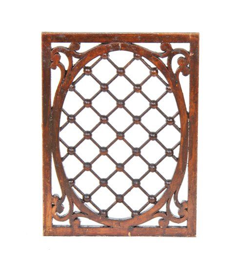 intact c. late 19th century varnished oak wood interior residential stick and ball latticework with floral motifs