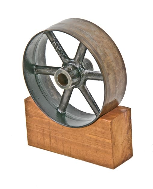 original and heavily reinforced vintage american industrial factory machine shop cast iron spoked pulley freestanding display 