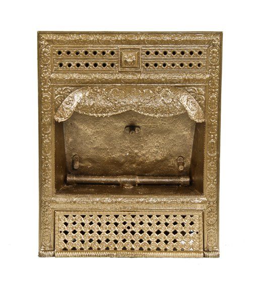 largely intact late 19th century interior residential ornamental cast iron fireplace gas insert or grate with metallic gold enameled finish 