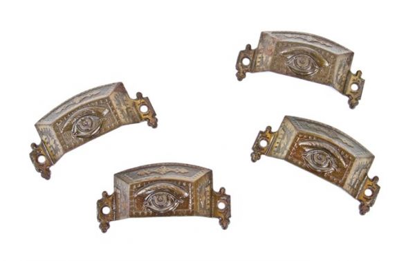 four original matching 19th century american ornamental cast iron egyptian revival "seeing eye" furniture cabinet drawer pulls 