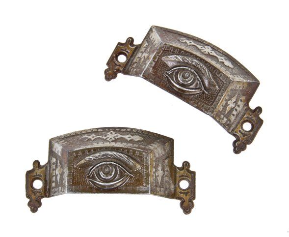 pair of original 19th century american victorian era ornamental cast iron "all-seeing eye" cabinet drawer or bin pulls