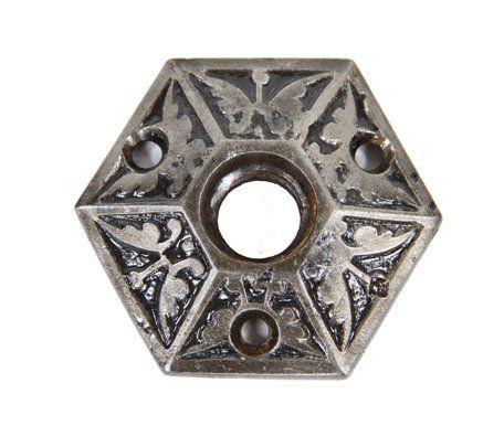 original c. 1870's antique american ornamental cast iron hexagonal-shaped doorknob rosette with a butterfly design motif