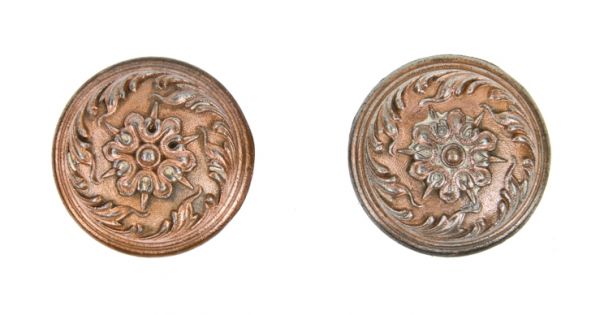pair of original c. 1900's american passage size interior residential "piccadilly" pattern copper-plated cast iron doorknobs 