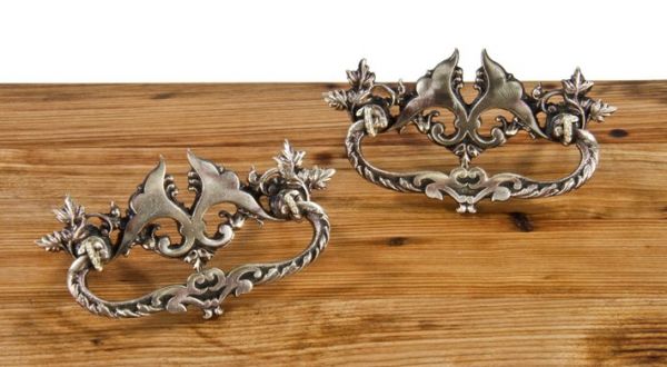 set of early 20th century antique american ornamental cast brass residential cabinet drawer pulls with detailed leafage 
