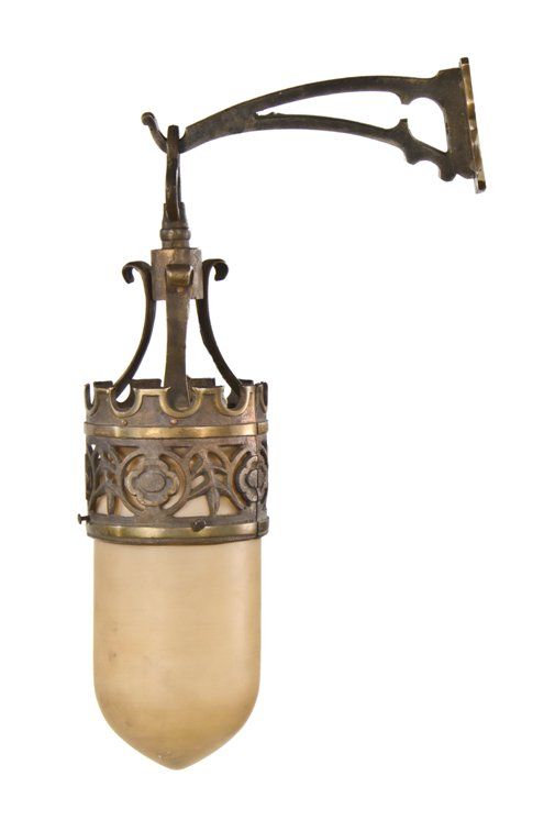 remarkable c. 1917 american gothic style ornamental cast bronze interior church wall sconce with baked enameled "bullet" shade 
