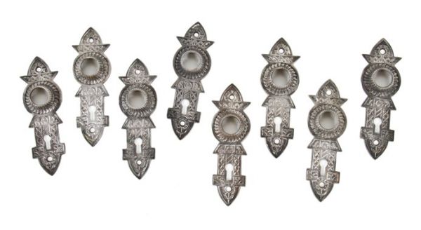 large lot of matching 19th century american ornamental cast iron interior residential "niles-chicago" doorknob escutcheons 