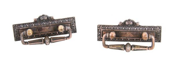 pair of original early 20th century american ornamental cast iron neoclassical style cabinet drawer pulls with functional drop handles 