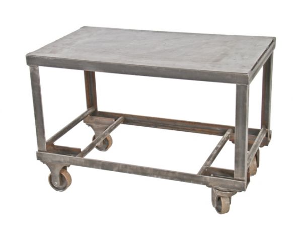 fully functional american industrial heavy gauge angled steel factory machine shop cart with intact stationary and swivel casters