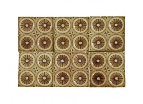 six matching all original c. 1886 david c. cook mansion interior majolica glazed hamilton fireplace surround tiles containing circles with sunken centers 