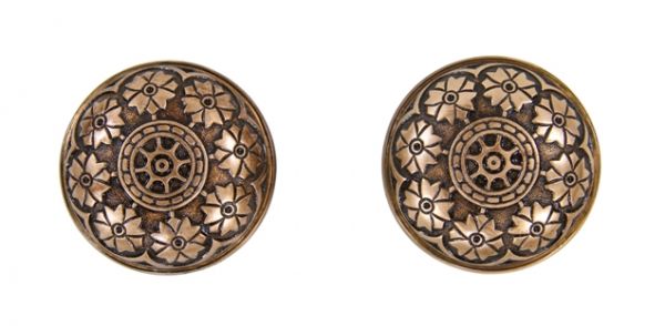 set of original 19th century american antique ornamental cast brass interior residential banded rim doorknobs with "pinwheel" motif