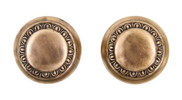 matching set of original c. 1900's american ornamental wrought bronze "athens" pattern interior residential passage size doorknobs with egg & dart design motif