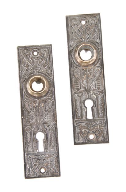 two matching original c. 1880's american eastlake style ornamental cast iron "oriental" pattern interior residential doorknob escutcheons with brass thimbles