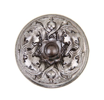 late 19th or early 20th century original ornamental wrought steel passage size residential uniquely-designed doorknob with deeply sunken center