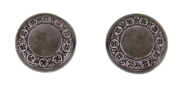 two matching c. 1900's antique american ornamental cast iron "geneva" pattern residential passage size doorknobs with alternating leafage and rosettes