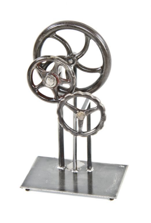 custom-built american industrial repurposed welded joint steel factory spoked pulley display stand with brushed metal finish 