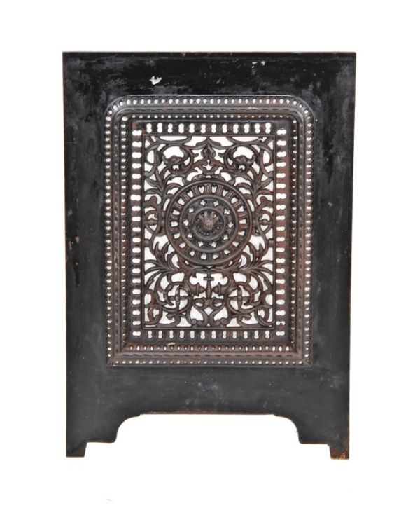 antique american c. 1870's ornamental pierced cast iron interior residential fireplace summer cover with original "japanned" surface finish