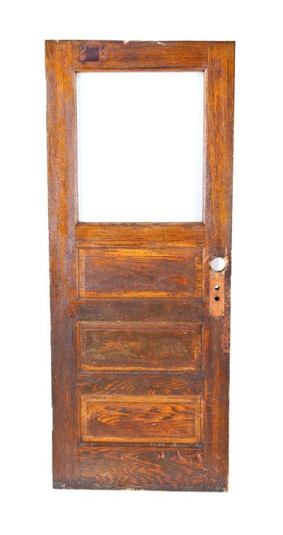 c. 1900 original and largely intact american chicago two-flat varnished oak wood raised panel entrance door with beveled edge plate glass panel