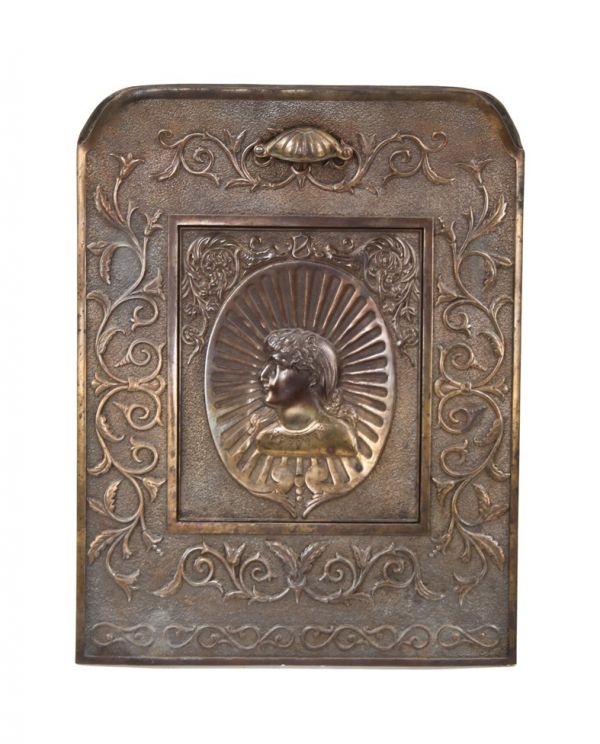 rare c. 1890's american victorian era ornamental cast iron residential figural summer cover with partially intact oxidized copper-plated finish 