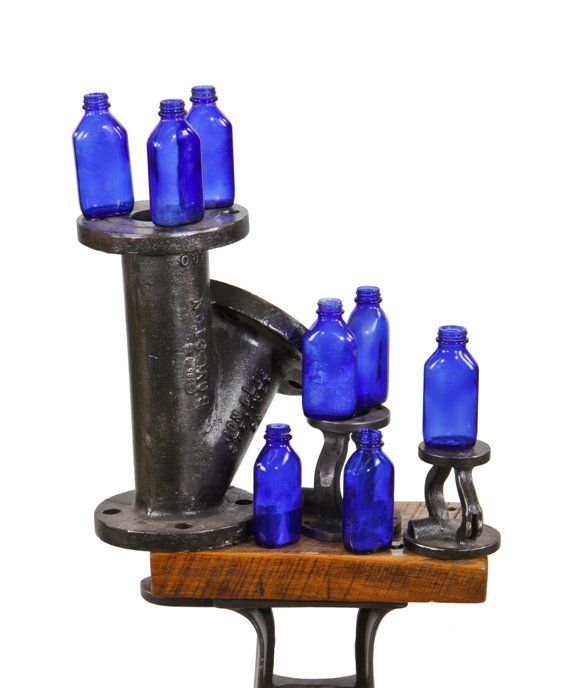 lot of 7 matching vintage american medium-sized cobalt blue glass "milk of magnesia" phillips capless apothecary bottles 