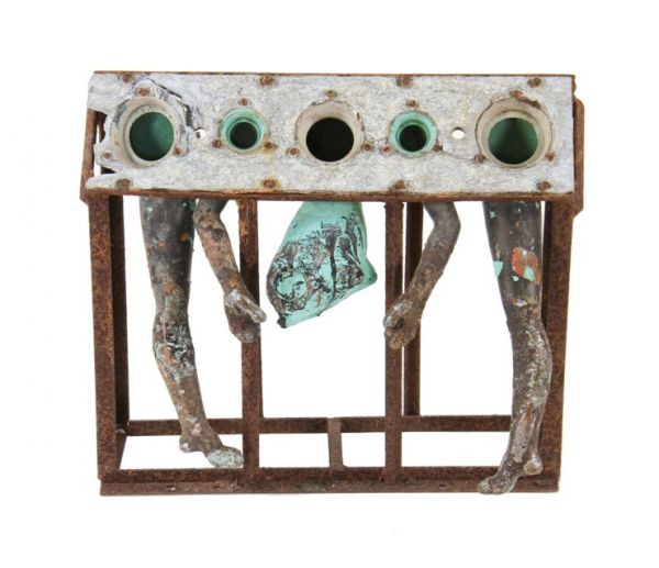 very unique freestanding weathered and worn c. 1960's american industrial doll mold rack with a complete set of stationary appendages 