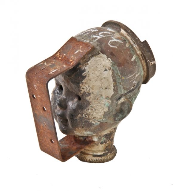 uniquely shaped c. 1960's vintage american industrial reinforced copper infant doll head mold containing surface oxidation and resin 