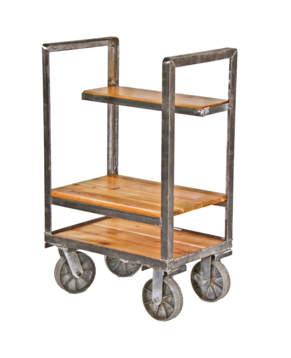 vintage modified american heavy gauge angled steel mobile multi-purpose supply cart with cast aluminum treaded wheels 
