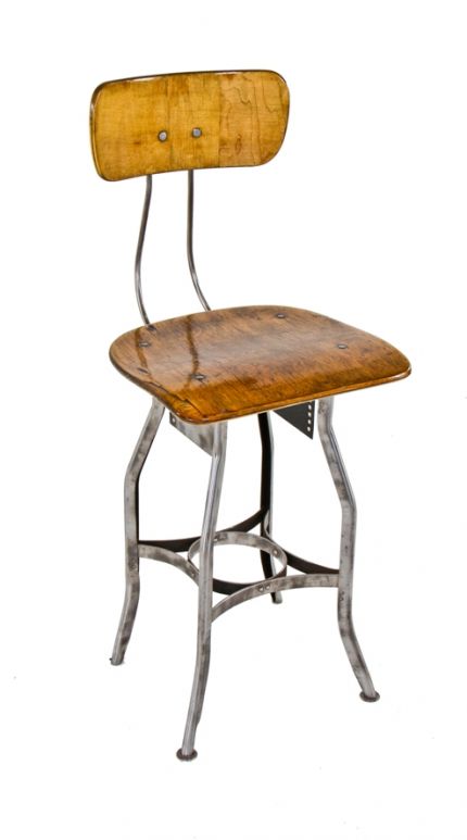 adjustable height american antique industrial "uhl art steel" four-legged pressed and die formed toledo workbench factory stool with refinished saddle seat and backrest
