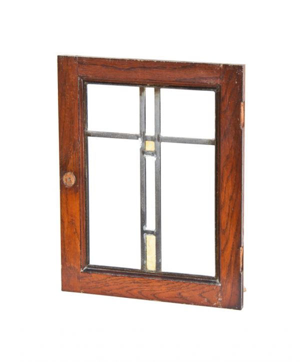 antique american interior residential varnished oak wood prairie school style chicago bungalow casement window with caramel slag glass
