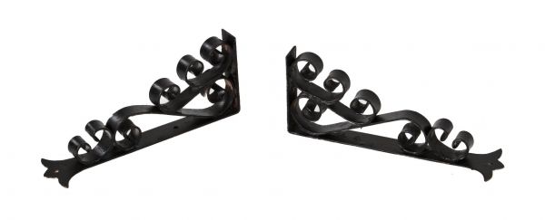 matching set of original depression era chicago movie theater spanish revival style ornamental wrought iron brackets or corbels