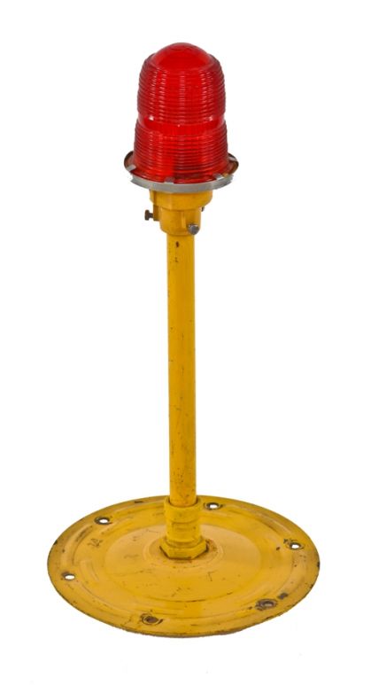 original vintage industrial yellow freestanding midway airport landing strip light with ruby red lens