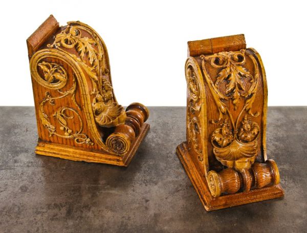 matching set of early 20th century highly ornate varnished oak wood and gesso interior residential corbels with fanciful volutes