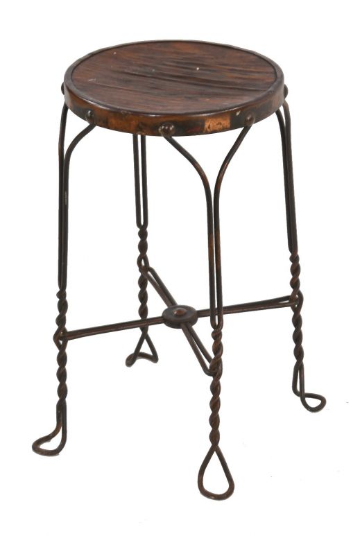 all original late 19th or early 20th century "wearproof" four-legged twisted steel ice cream parlor chair with oxidized copper-plated finish 