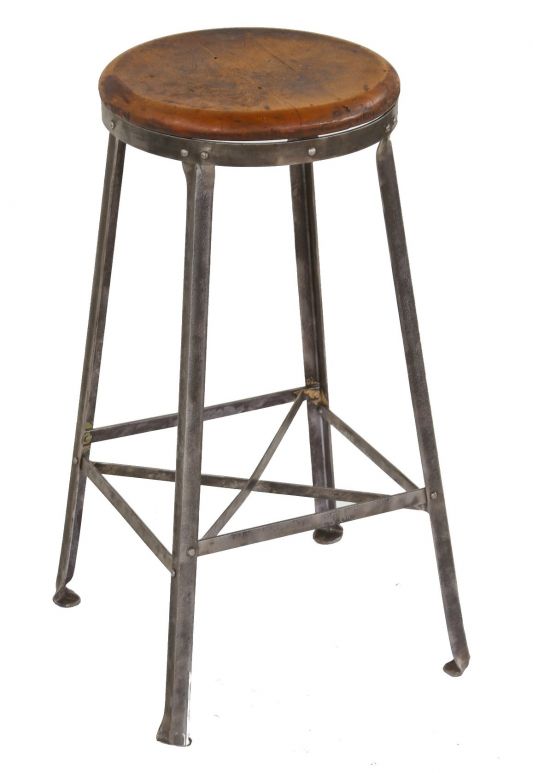 antique american industrial brushed four-legged metal factory machine shop "otsteel" workman stool with inward turned feet