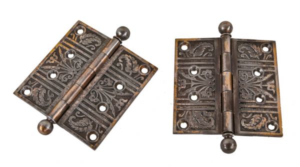 american antique loose pine ornamental cast iron residential passage door hinges with traces of a copper-plated finish