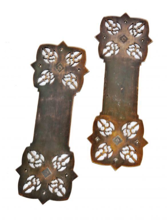 pair of historically important gothic style 19th century museum quality james charnley residential interior ornamental cast bronze door push plates  