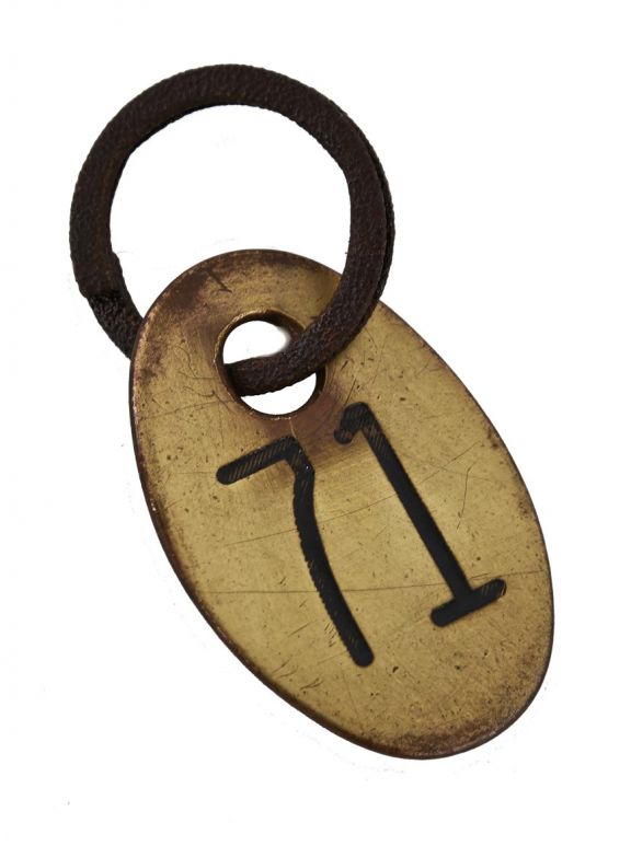 original double-sided c. 1920's american industrial wrought brass cattle identification tag with lightly incised number